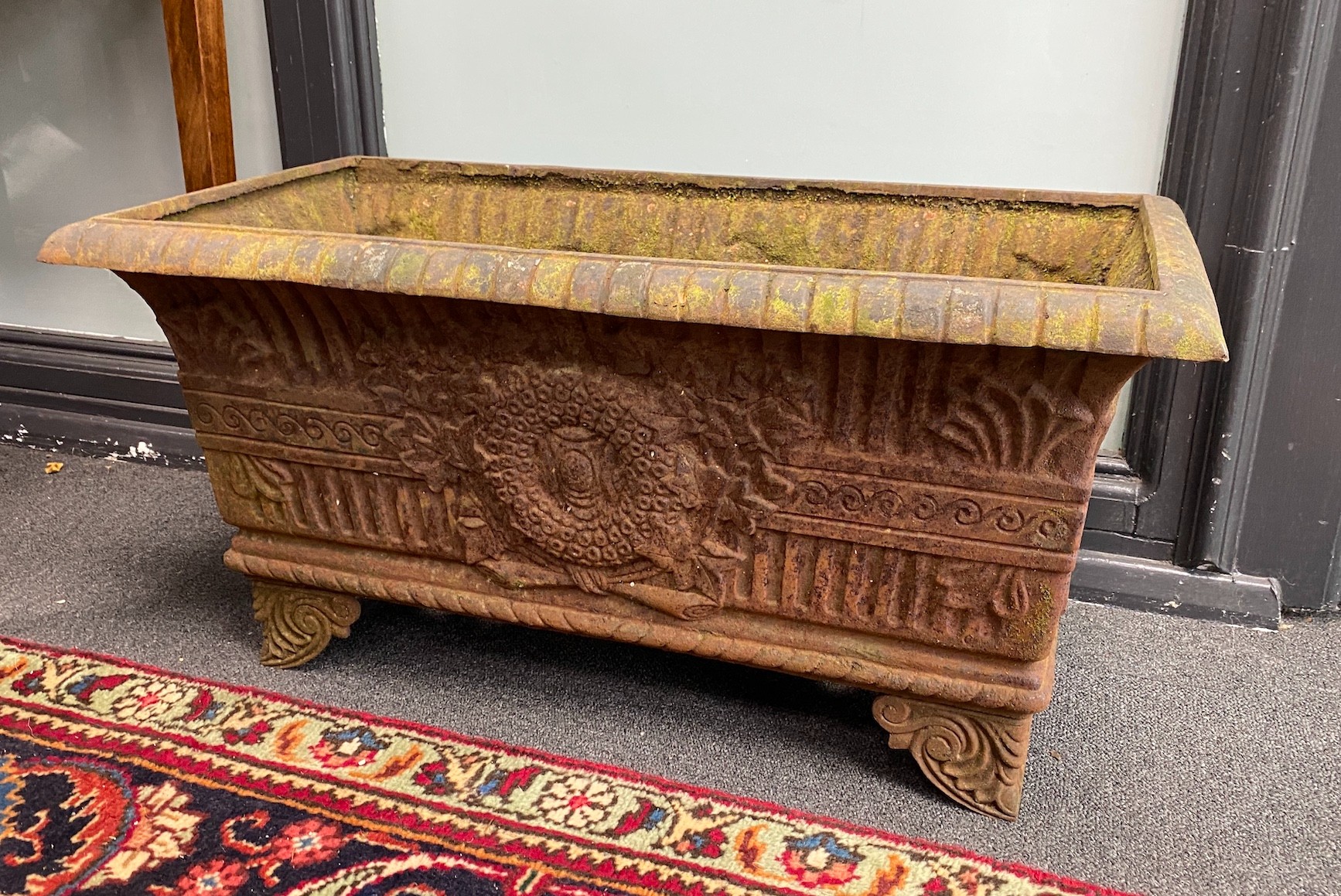 A Victorian style cast iron garden planter, width 70cm, depth 35cm, height 35cm